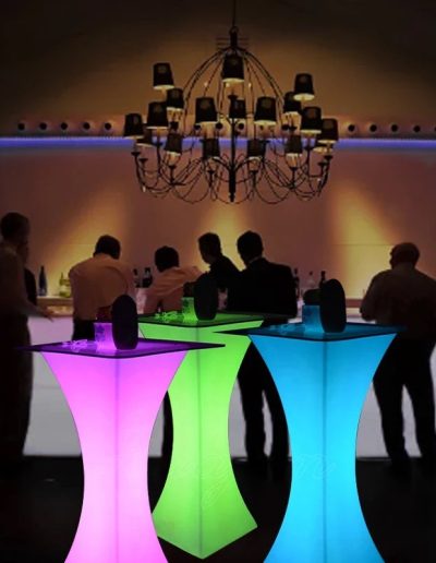 cocktail tables lit up at event