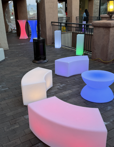 lounge set, pillars and tall tables illuminated